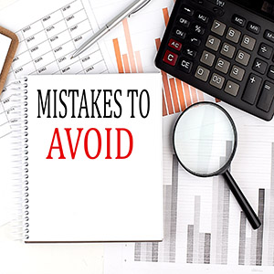 Tax documents and calculator illustrating bankruptcy filing mistakes to avoid