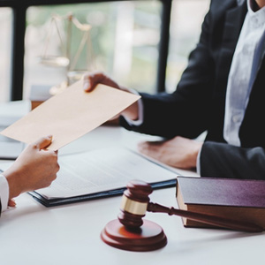 Lawyer reviewing documents for an accident claim case